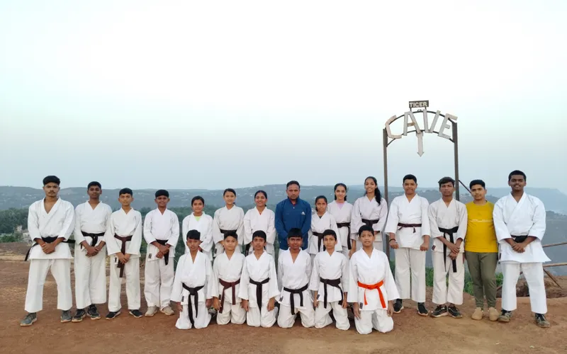 Students practicing defensive blocks and strikes in a seminar workshop